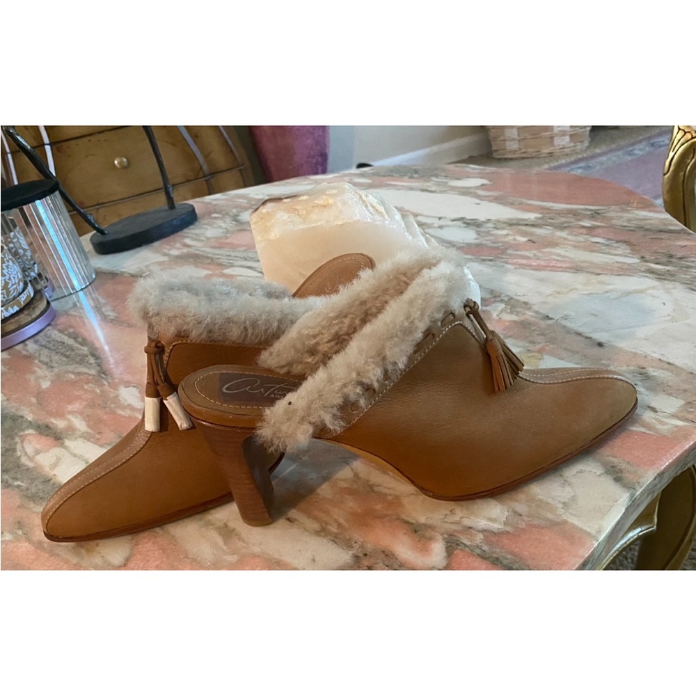 Beautiful tan suede shearling-lined mules. Brand new. Never worn.
